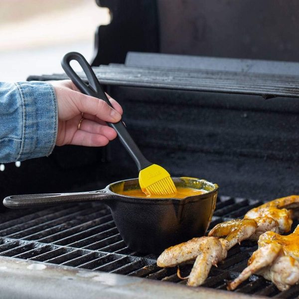 Lodge 15.2 Ounce Cast Iron Melting Pot + Silicone Basting Brush - Unparalleled Heat Retention - Heat Resistant Basting Brush up to 450° - Black and Yellow - Image 2