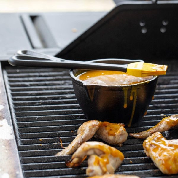 Lodge 15.2 Ounce Cast Iron Melting Pot + Silicone Basting Brush - Unparalleled Heat Retention - Heat Resistant Basting Brush up to 450° - Black and Yellow - Image 4